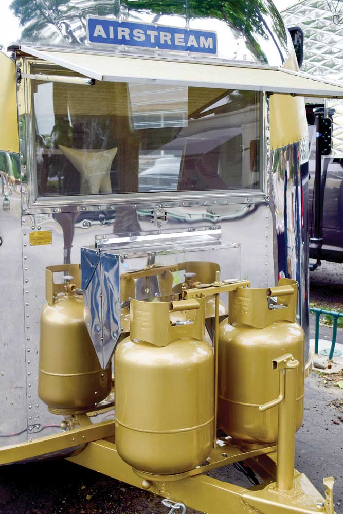 LP gas cylinders restored to gold color as original.