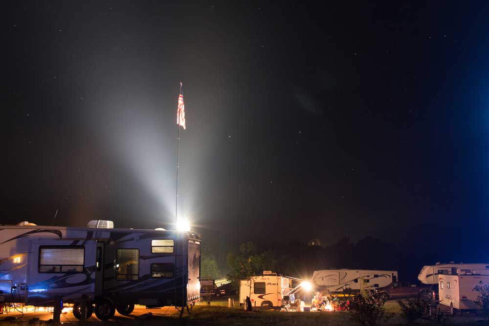 Flag over Echo-Bluff State Park, Missouri at night