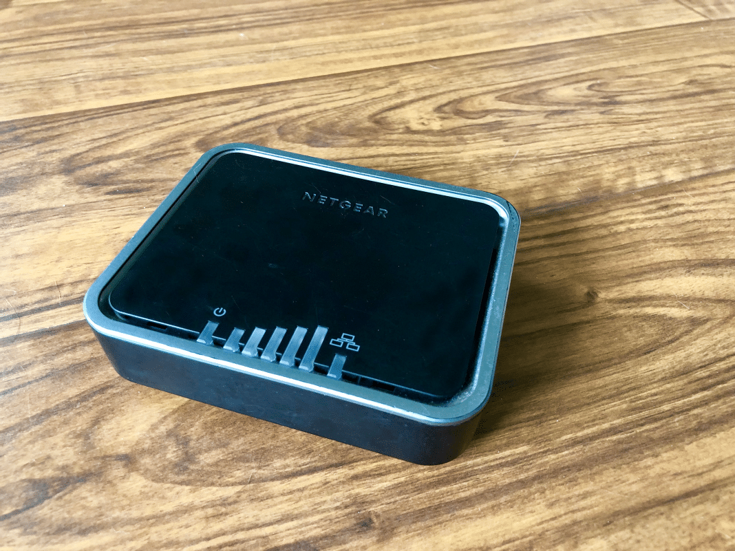 Netgear LTE modem on wood surface