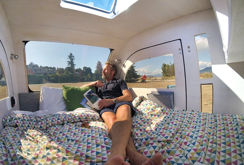 Windows and a skylight bring light into the Droplet teardrop trailer.