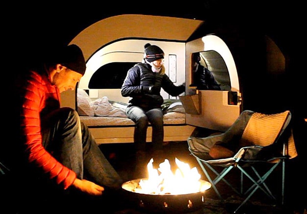 The Droplet's wide doors allow comfortable seating and campfire access.