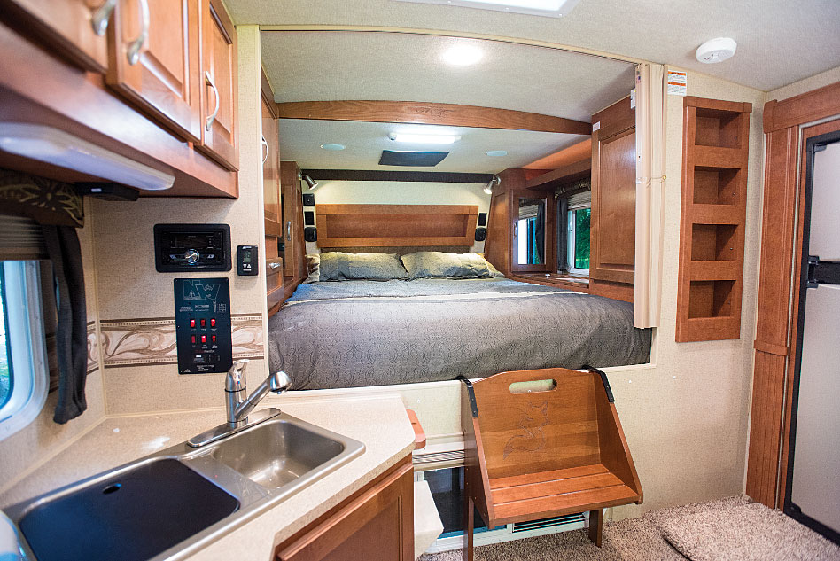 An arched ceiling is new for 2017, increasing interior headroom by 4 inches and making the cabover sleeping area more spacious.
