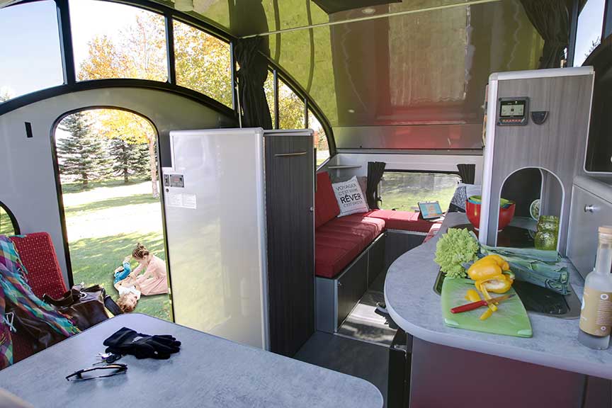 Interior of the Alto trailer with the roof extended and door open