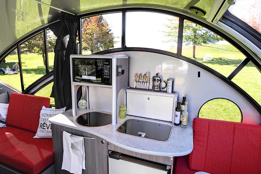 Galley of Alto trailer with microwave, sink and counter