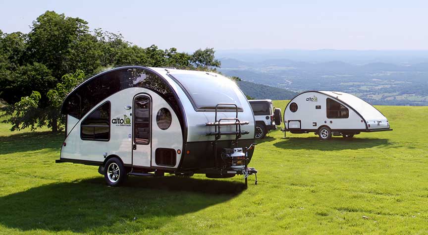 R Series Alto trailer in foreground on grassy field, and F Series Alto in background