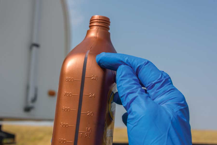 Check the owner’s manual (often available on the generator manufacturer’s website) to find out how much oil is required, and estimate that amount using the hash marks on the side of the new oil container.