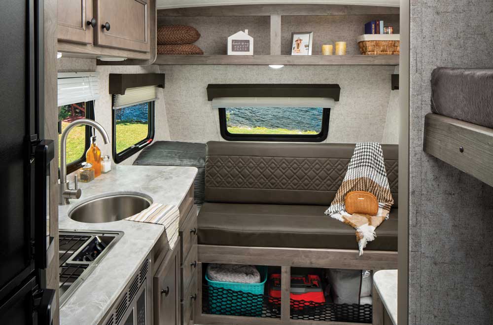 Coachmen Apex Tera I5T travel trailer interior, front seating, kitchen