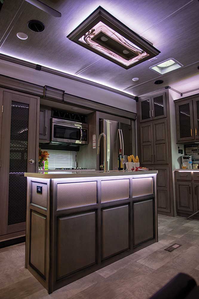 Indirect LED lighting above the kitchen in the Keystone Montana 3931FB fifth-wheel travel trailer