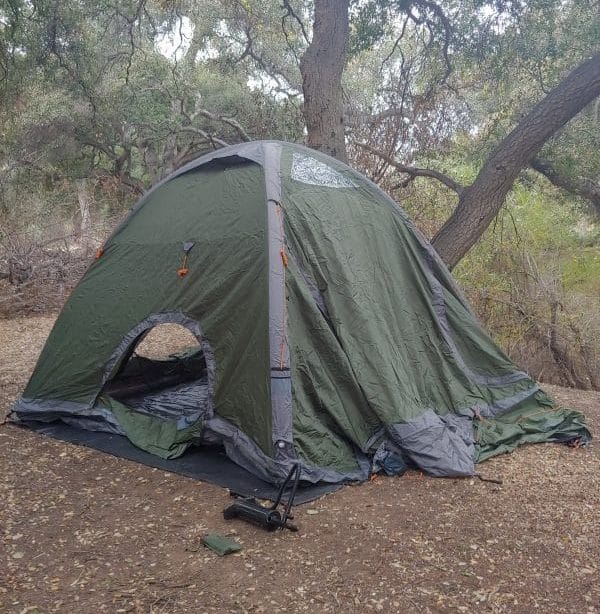 Green Crua outdoors Core tent setup in the woods