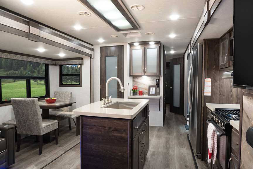 Kitchen island in Open Range 322RLS travel trailer