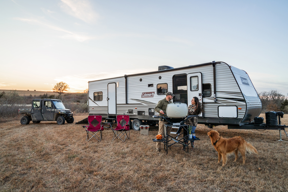 Campers at a campsite cooking out