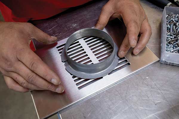 22-24) The vent is modified to hook up to the ductwork.