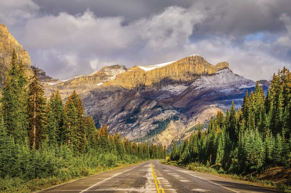 The Icefields Parkway, Highway 93, cuts a 145- mile swath through the Rockies between the mountain towns of Lake Louise and Jasper.