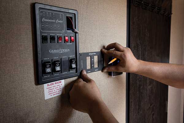 34) Propane and electric switches are mounted inside the trailer.