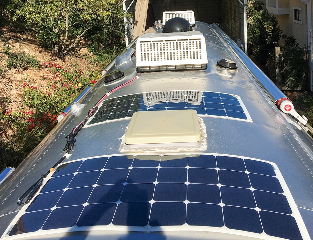 Two solar flex panels provide additional charging power for the batteries.
