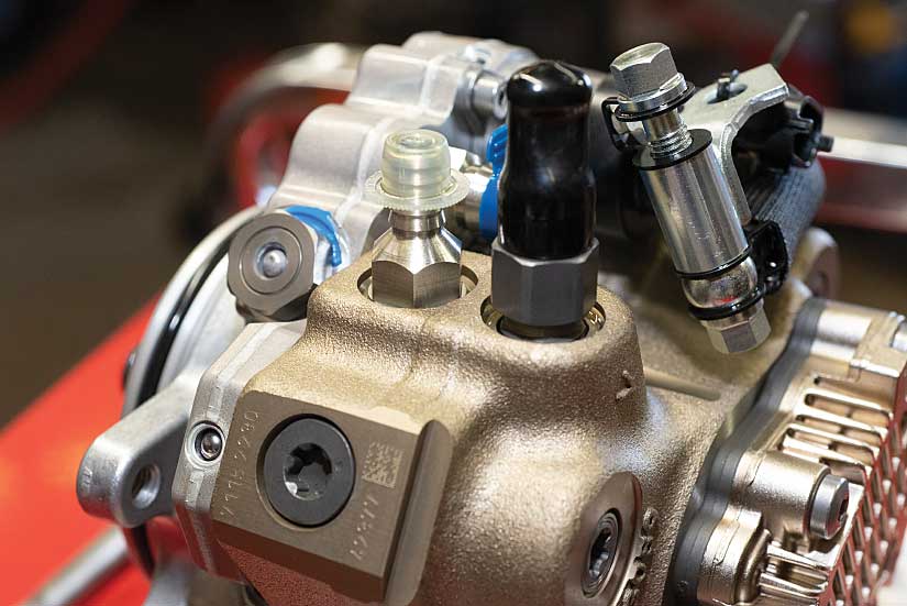 Photo showing how S&S Diesel’s engineers made multiple internal and external modifications to the factory CP3 pump so it would match the fuel-flow requirements of the LML Duramax’s piezoelectric injectors and work seamlessly with the factory EGR system, including the “ninth injector.”