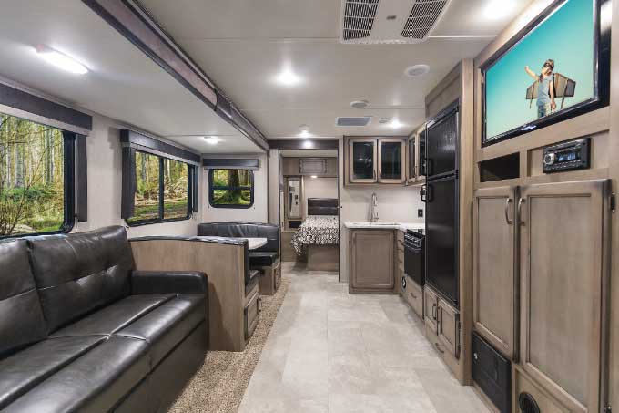 Production on the 32-foot Transcend 27BHS, Grand Design RV’s first “stick-and-tin” travel trailer, starts this spring.