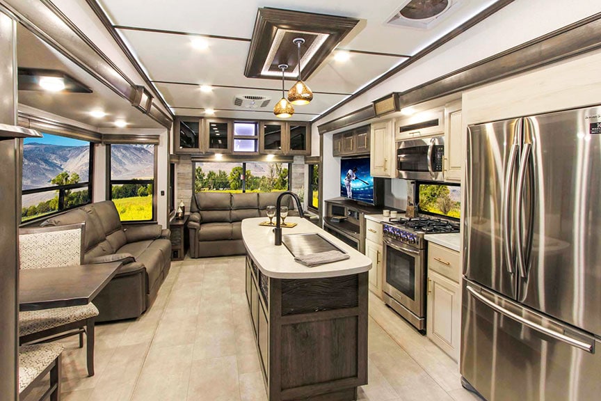 Inside Paradigm 370FB fifth-wheel looking toward kitchen and living area