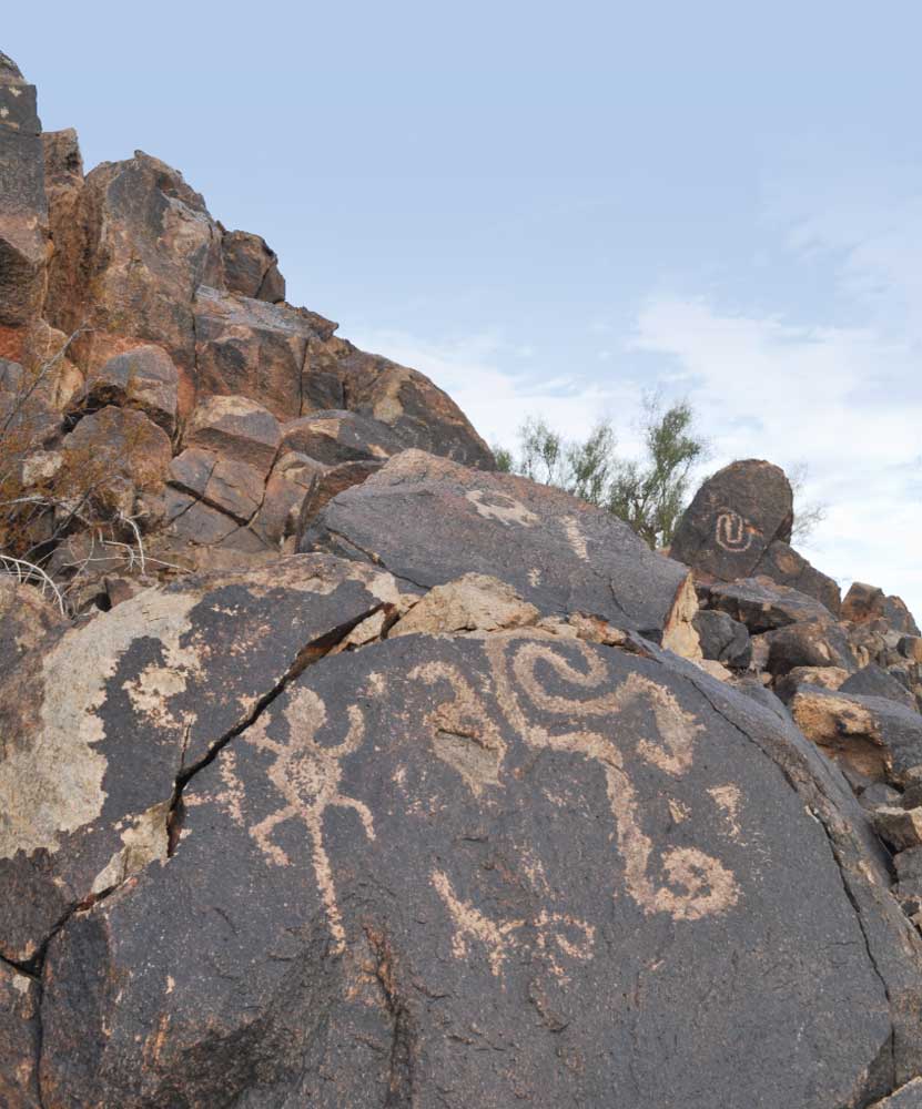 Traversing rough desert routes is necessary to reach ancient petroglyphs north of Gila Bend.