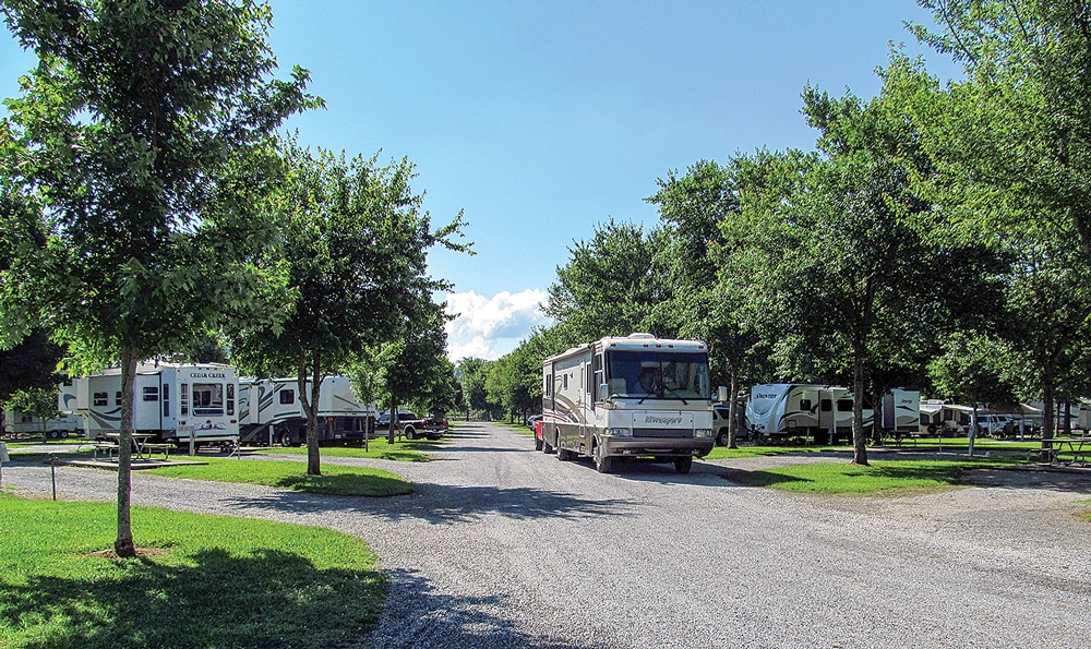River Plantation RV Resort features big-rig-accessible, full-hookup sites (some by the Little Pigeon River) with concrete patios and picnic tables, shade trees, free Wi-Fi and lots of amenities.