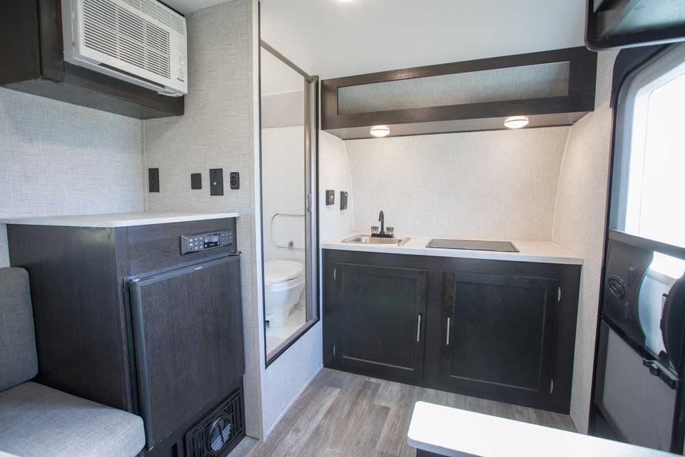 Braxton Creek Bushwhacker Plus interior showing kitchen and bath area