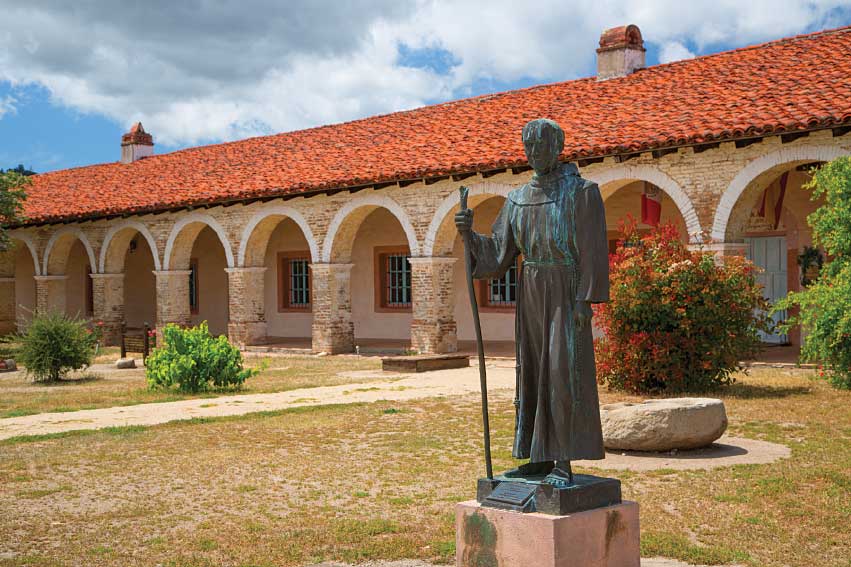 This statue of Padre Junipero Serra, one of the mission’s founders, stands in front of Mission San Antonio de Padua, at Fort Hunter Liggett Military Reservation in Monterey County.