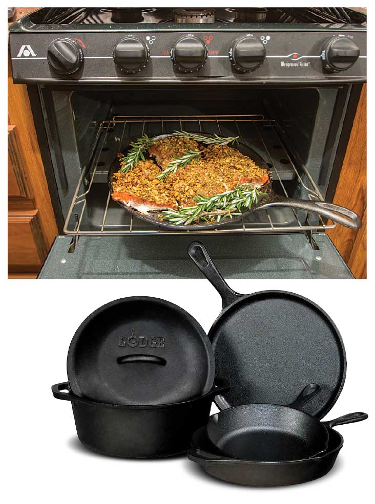 Cast Iron cookware and a crusted salmon on a cast-iron grill in an RV oven