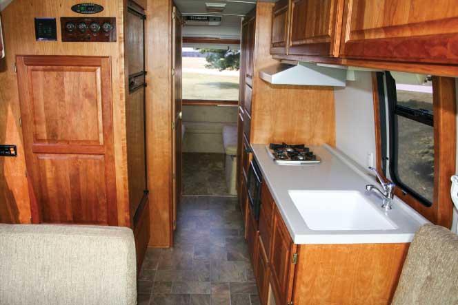 The galley of a renovated GMC Palm Beach