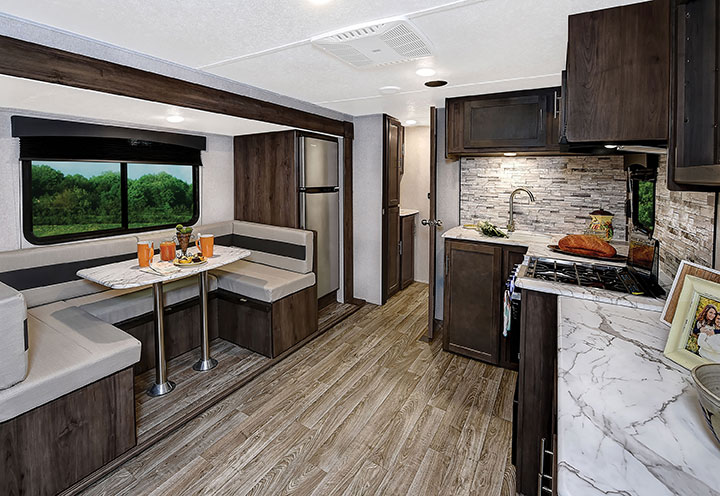 U-shaped dinette and kitchen in Coachmen Clipper Ultra-Lite 262BHS