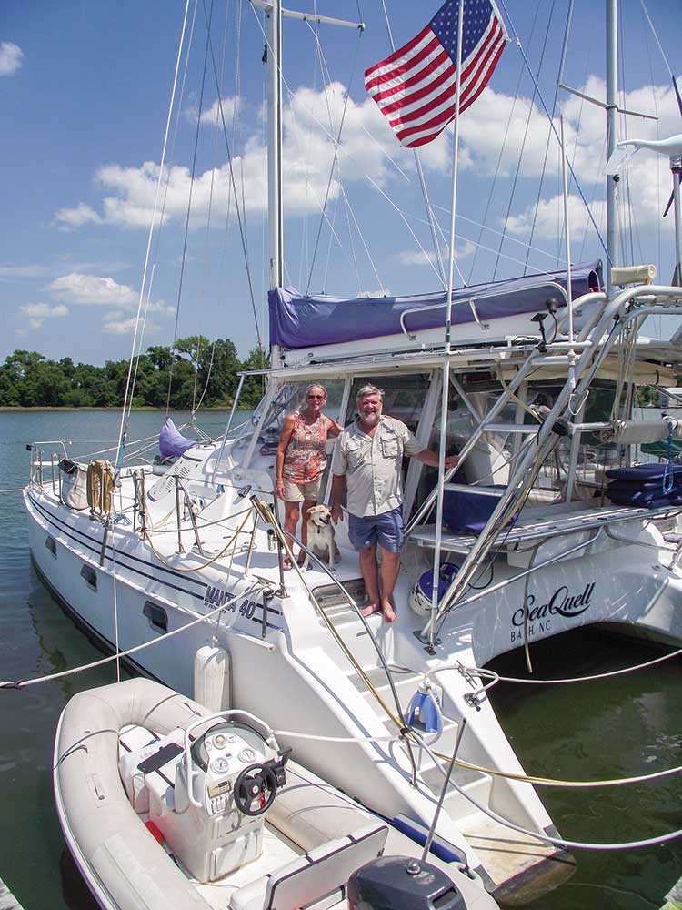 Robert, Becky and Maggie aboard their other “mobile” home, a catamaran.