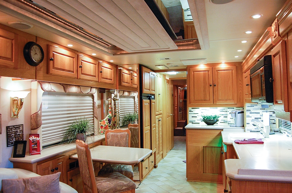  New bronze cabinet hardware complements the motorhome's original neutral color scheme.