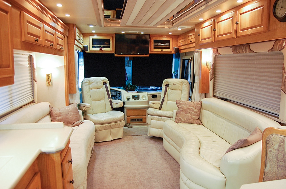  In the cockpit area, redesigned cabinetry and a new TV provide an additional 5 inches of clearance above the dash.