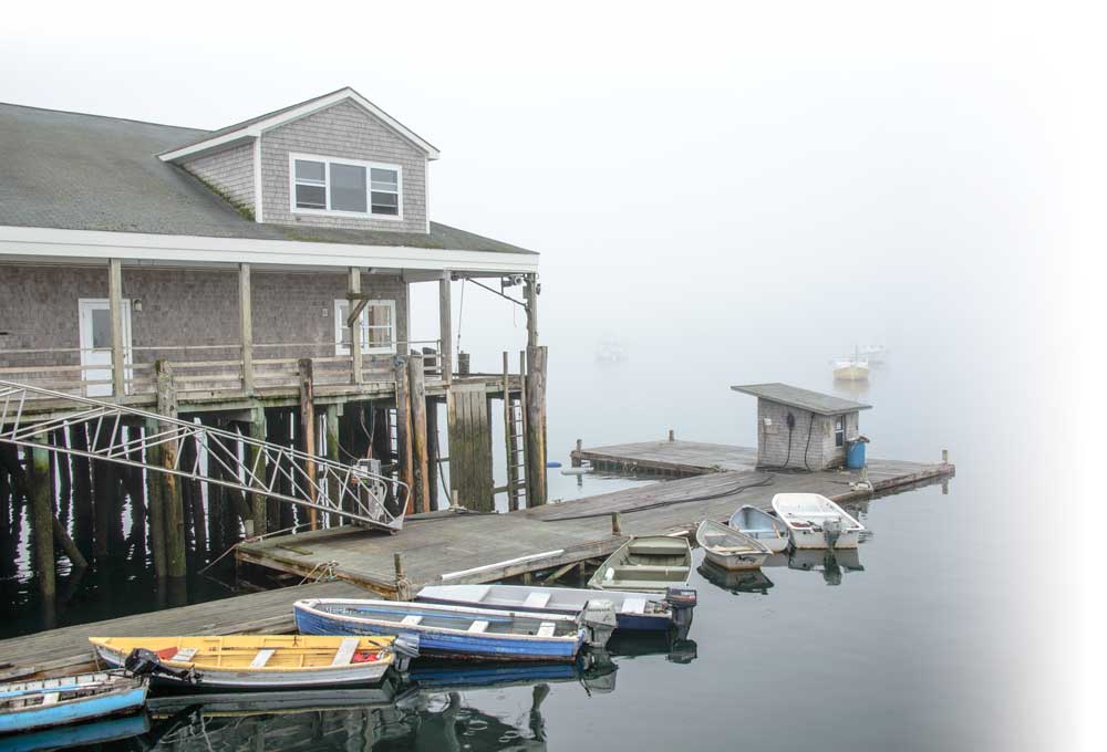 Mist and fog shroud the dinghy dock at Bass Harbor, a quaint fishing village on Mount Desert Island.