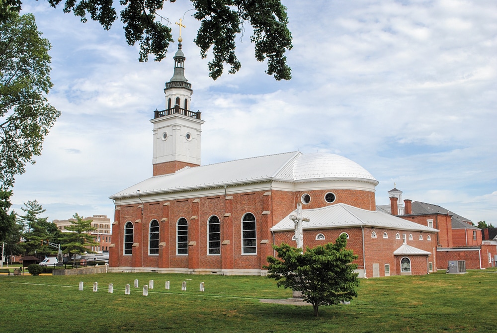 The elegant Basilica of St. Francis Xavier, also known as the Old Cathedral, was built in 1826 and is the fourth church on the site. It is located opposite George Rogers Clark National Historical Park.