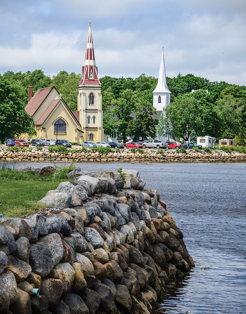 Completed in 1887, the elegant St. James church makes a striking image on the shores of Mahone Bay in the harbor town named for the waterway.