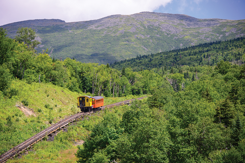 The once-a-day steam-engine trip is pure 1875 technology, while the quieter and quicker biodiesel engines (above) take riders up the mountain with the latest in cog-rail engineering.