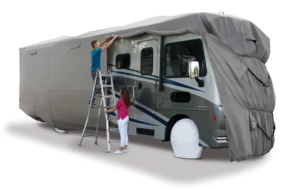 two people covering up rv with Elements Premium rv cover