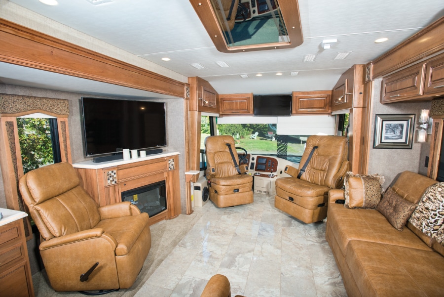 The comfy Ultraleather pilot and co-pilot seats, in addition to the living-area furniture, are by Villa. The freestanding recliner can be moved as necessary.