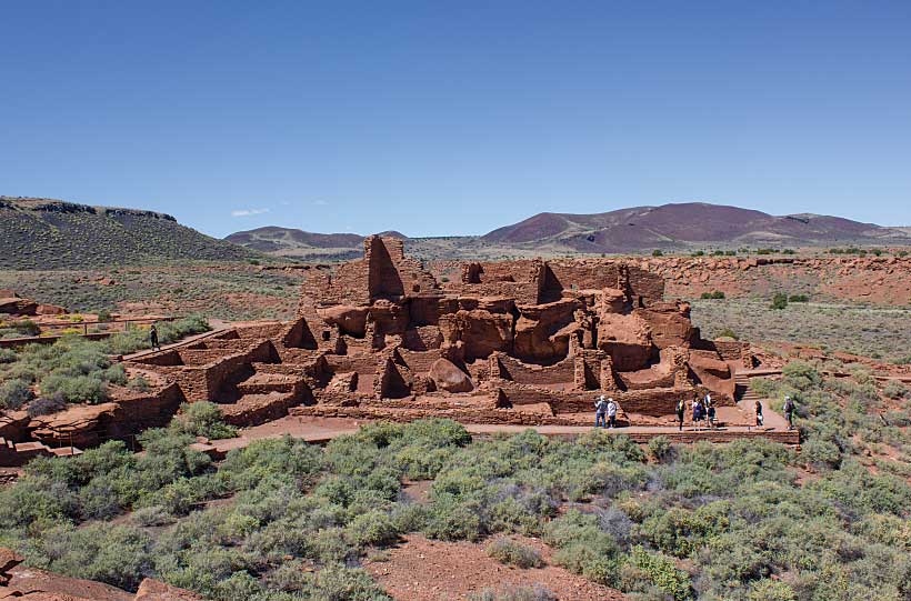 The Wupatki Ruins Complex at Wupatki National Monument includes a dwelling with more than 100 rooms, a community room, a ball court and two kivalike structures.