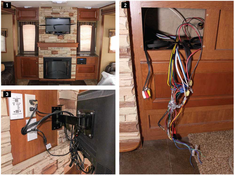 1) The original entertainment system, which consisted of a basic DVD stereo and a TV held to the wall with a vinyl strap for transit, was adequate but needed to be updated. 2) Removing the stereo revealed the wiring harness and RCA connections to the factory-installed TV. These had to be changed to a new harness, and an HDMI cable was added for the HDMI-ARC feature. 3) The original TV has a basic nonlocking articulating mount that didn’t reach out far enough for good viewing from the couch or the theater seating. Also, there wasn’t enough wiring for the entertainment system to connect to the TV.