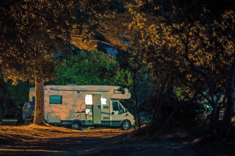 Motorhome Vacation Travel. Calm Camping Night inside RV Camper Van.