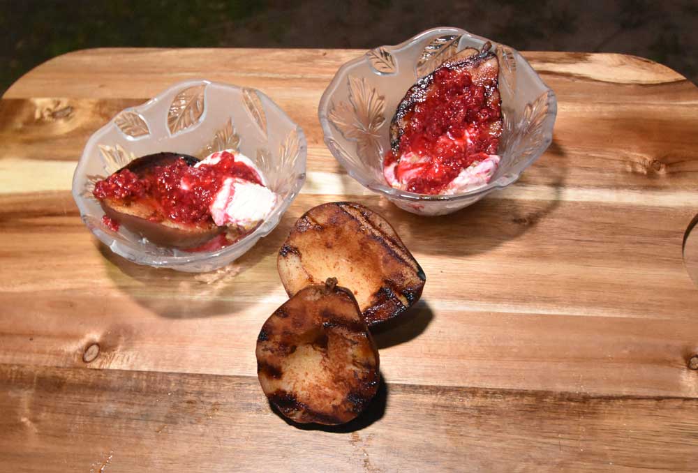 Photo of grilled pears and ice cream with rasberry sauce