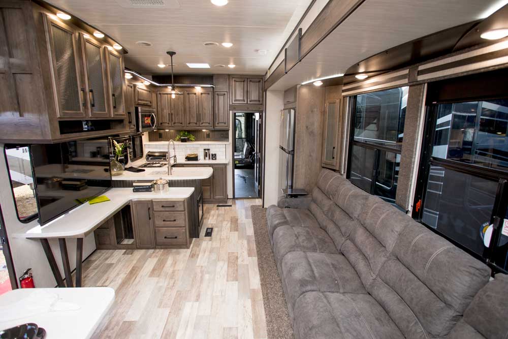 Living area and galley of Heartland Cyclone 4101 King Toy Hauler RV