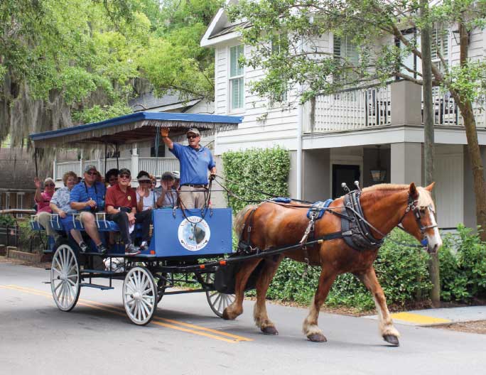 A horse-drawn carriage tour is a great way for visitors to see many of the town’s older homes and structures.