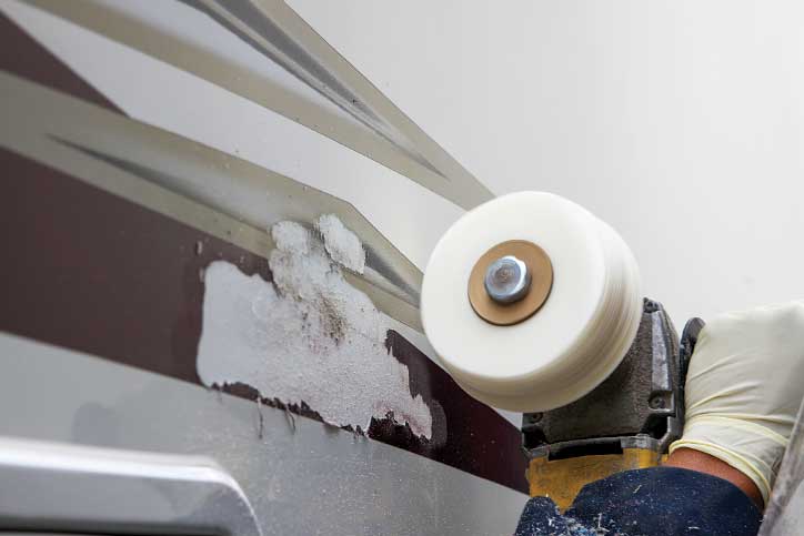 A special tool from 3M is used to remove baked-on vinyl that will not come off with a heat gun or scraper tool.