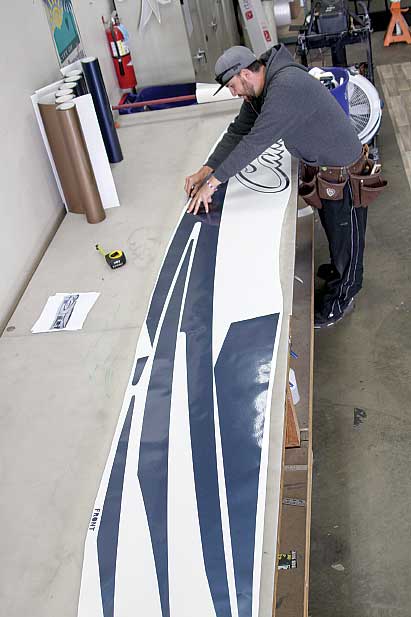 The “weeding and taping” process is used to prep the new vinyl prior to installation. This process is critical and requires great patience.