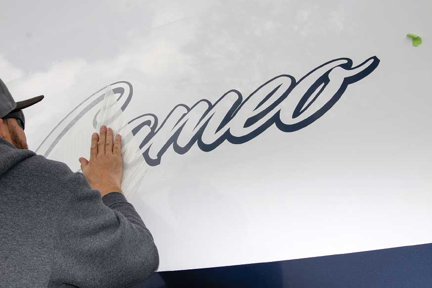The new logo is put in place, and the outer layer is removed.