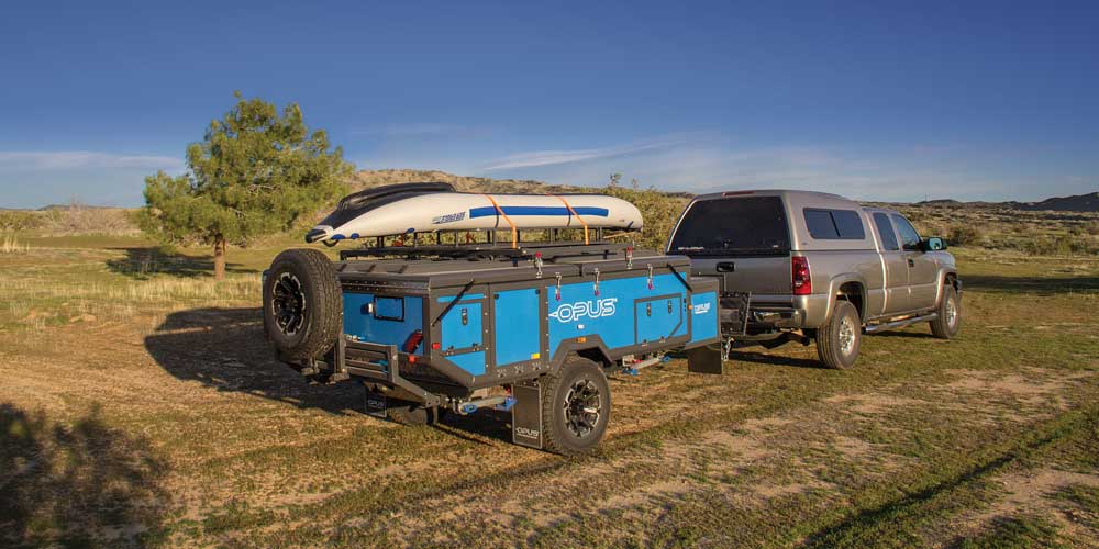 Next stop: Southern California’s Zuma Beach for kayaking. The side-pivoting cargo rack, rated for 700 pounds, lifts easily out of the way when setting up the OPUS.