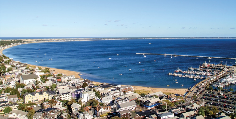 The view from the top of the 252-foot Pilgrim Monument in Provincetown shows off the Cape’s iconic curve.