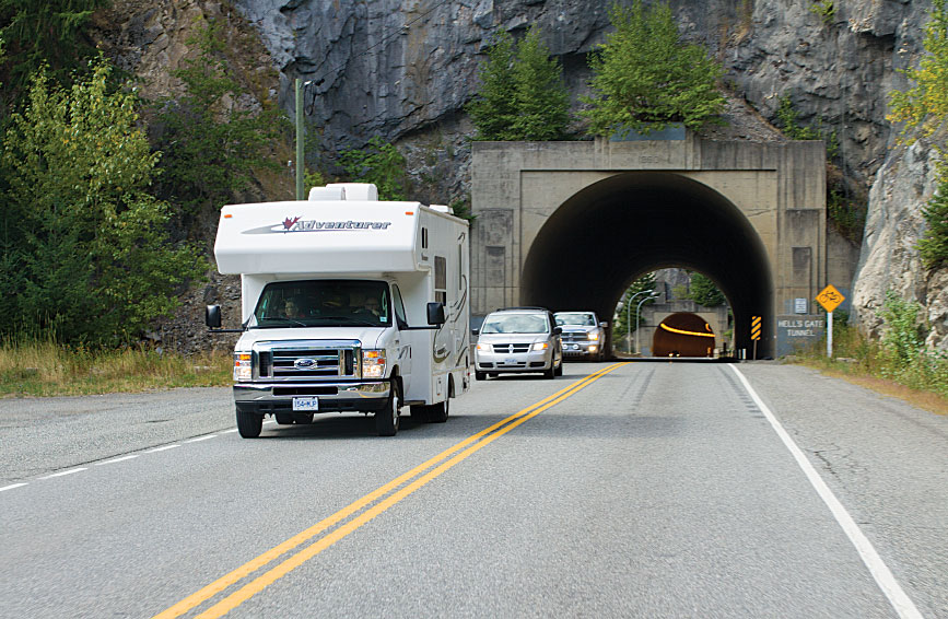 A motorhome plies Highway 1 near Hell’s Gate, British Columbia.